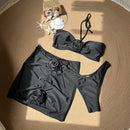 Eugenia halter black bikini con falda