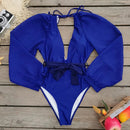 Blue backless surfer